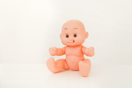 Toy for little children. Pupsik plastic for kids. Doll for girlsの写真素材