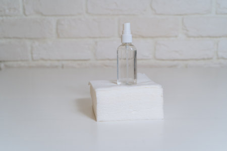 Antiseptic and paper napkins closeup. Personal hygiene products in an epidemicの写真素材