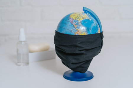 Personal hygiene items after the street. Mandatory hand treatment with soap and antiseptic. Clean hands as a measure of protection against the virus. Homemade protective masks for a pandemicの写真素材