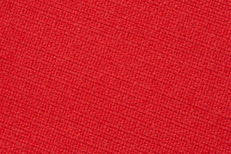 red wool fabric texture, diagonally arranged upholstery cloth backgroundの写真素材