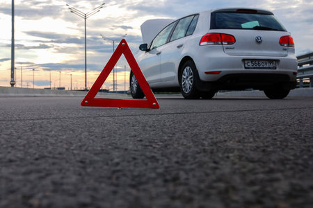 Moscow 06/06/2019 Red traffic light, truck passing through toll gate behind itのeditorial素材