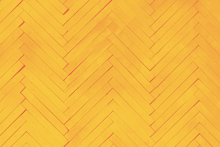 yellow wall textured background with painted wooden boards arranged in herring bone pattern
