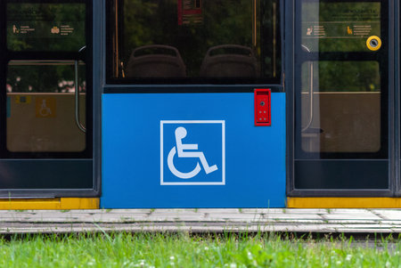 disabled sign by tram doors, city transport accessibilityの写真素材