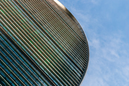 Modern office building against blue sky, Moscow, 07/28/2020のeditorial素材