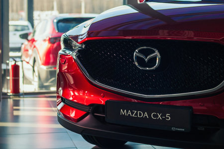 Mazda CX 5 crossover in auto dealer showroom, front view, Moscow, 18 Feb 2021のeditorial素材