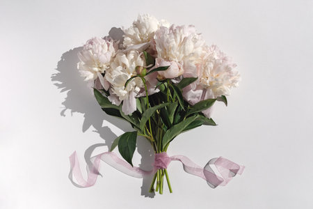Bunch of pink peonies on white backgroundの写真素材