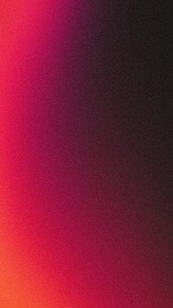 Red orange grainy gradient vertical background vibrant colors noise texture backdropの写真素材