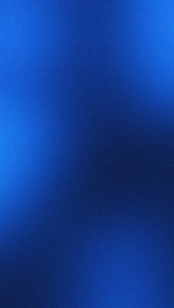 Dark blue grainy gradient vertical background noise texture abstract mobile wallpaper backdrop designの写真素材