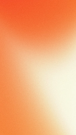 Vertical orange white gradient background grainy texture retro noise texture mobile wallpaper abstract designの写真素材