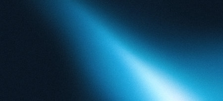 Glowing light blue ray abstract dark grainy background noise texture poster header backdrop cover designの写真素材