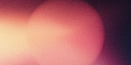 Red orange glowing sphere grainy gradient background soft blurred light on dark backdrop abstract banner designの写真素材