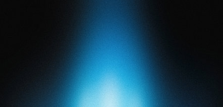Blue gradient background grainy glowing blue light on dark backdrop, noise texture effect banner header designの写真素材
