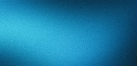 Blue gradient background grainy glowing blue light on dark backdrop, noise texture effect banner header designの写真素材