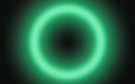 Glowing green light ring black background grainy gradient, noise texture poster banner backdrop abstract designの写真素材