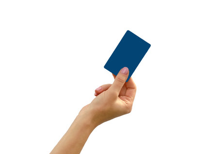 isolated female hand holding a credit cardの写真素材
