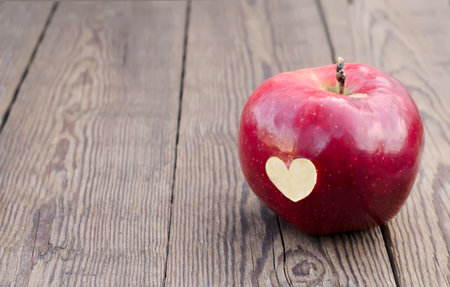 apple with a symbol heartの写真素材