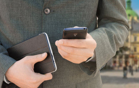 Businessman calls by telephoneの写真素材