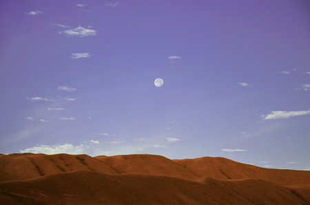 full moon in the mountainsの写真素材