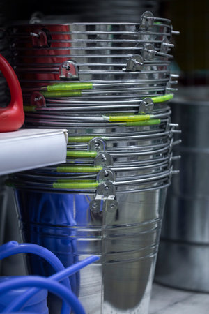 enameled bucket in household goods in the hardware store