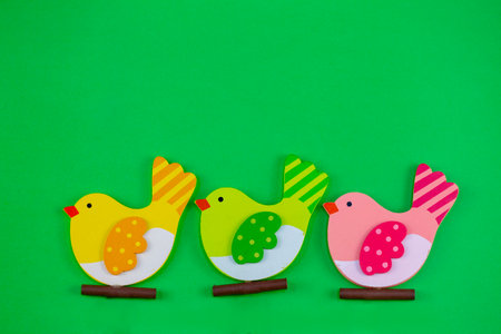 green texture with wooden Easter chickenの写真素材