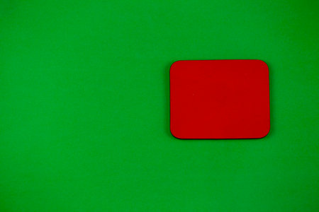 red wooden box for inscriptions on a green background