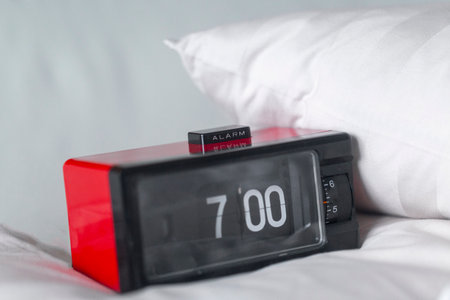 vintage retro alarm clock in the bedroomの写真素材