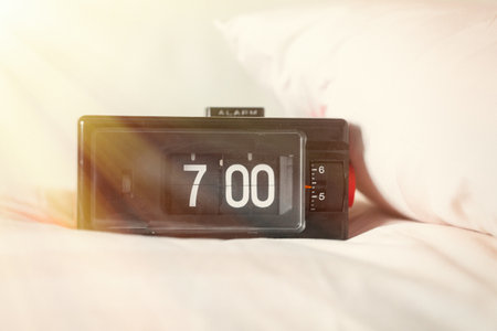 vintage retro alarm clock in the bedroomの写真素材