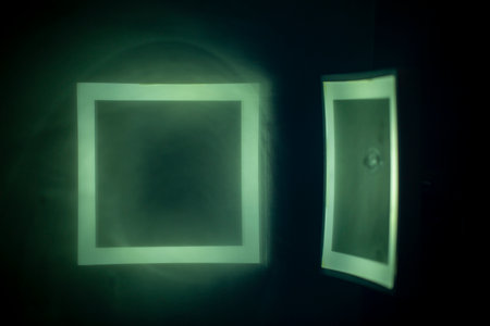 art background, fogged mirror is reflected in the second mirror, creating an illusion in dark...