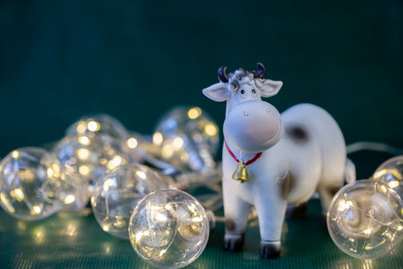 symbol of 2021, year of the bull, cow on a green background close-upの写真素材