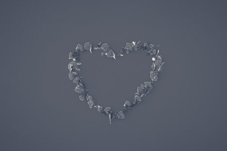 heart of yellow dried flowers on a blue monochrome background, a symbol of love, minimalismの写真素材