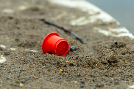 scattered children's sand toys in the sandbox in the park, close-upの写真素材