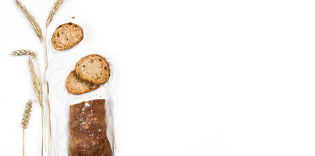 cut into slices of a loaf of dark bread made from rye flourの写真素材