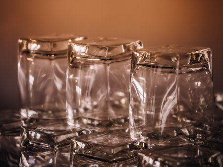 Empty whiskey glasses in restaurant. Background and soft focus.の写真素材