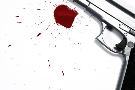Gun and blood splatter. Murder Sceneの写真素材