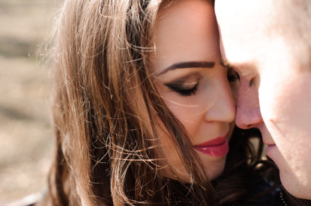Portrait of young couple in love in a park