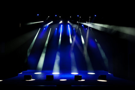 Free stage with lights, lighting devices as background.