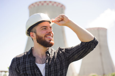 Handsom electrical engineer at an electrical stationの写真素材