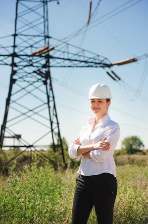 beautiful woman engineer work at an electrical substation.の写真素材