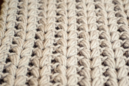Grey wool texture background. Knitting detailsof material.
