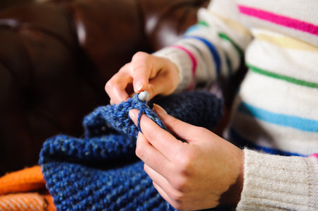 handmade knitting, leisure woman activity. detail photo