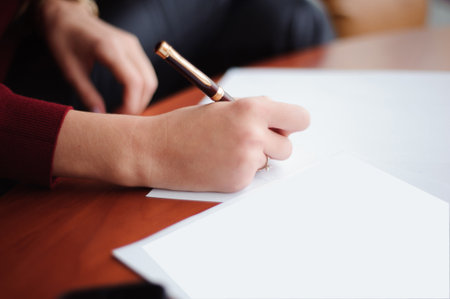 young businesswoman working with papers. Close up.の写真素材