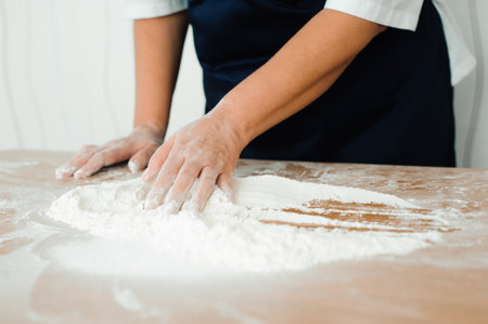 The chef prepares the dough - the process of making dough in the kitchen