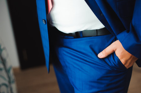 wedding details - elegant groom dressed wedding tuxedo costumeの写真素材