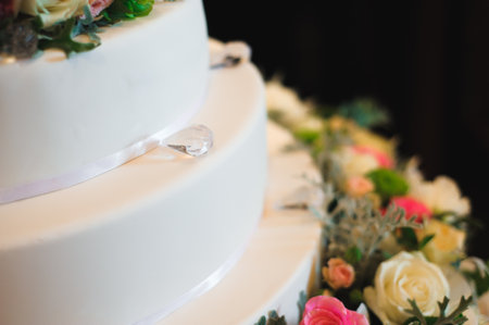 Wedding cake. Delicious sweet holiday buffet with desserts.の写真素材