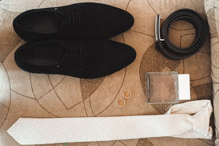 wedding details - elegant groom dressed wedding tuxedo costumeの写真素材