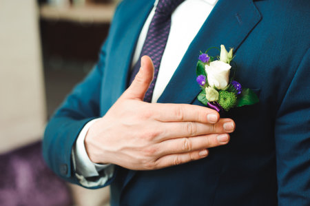 elegant groom dressed wedding tuxedo costume waiting for brideの写真素材