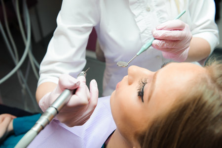 beautiful woman on the inspection of the teeth in dentistry.の写真素材