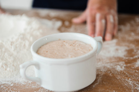 Chef preparing dough - cooking process, work with flour
