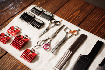 hairdressing tools on a towel - scissors, combsの写真素材