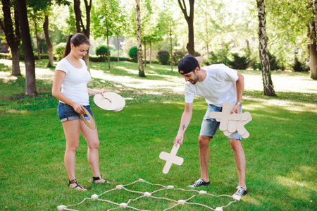 Tic tac toe game. Game on green grass